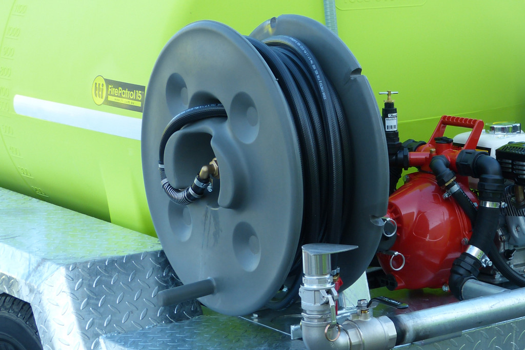 Fire hose reel installed on a truck